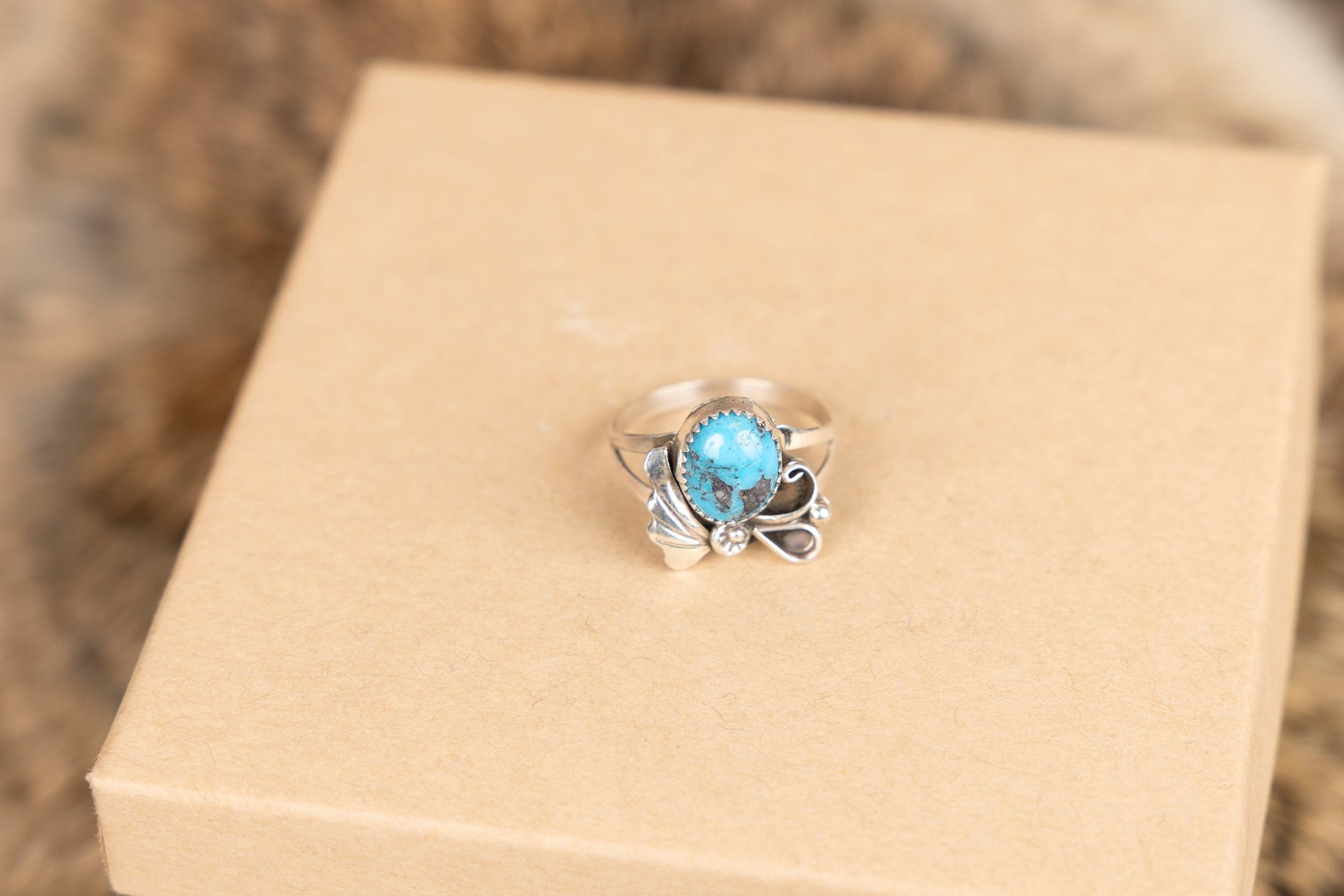 Turquoise Ring with Sterling Silver Half Ribbon